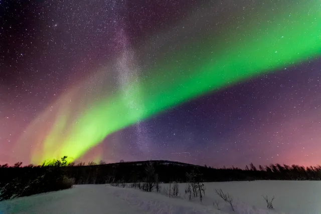 Northern lights with Milky Way in the Lyngenfjord Alps