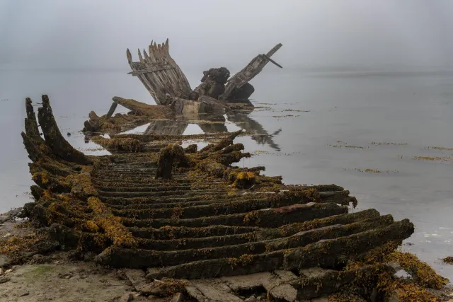 Ship skeletons in the ship graveyard of Rostellec near Crozon in Brittany